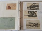 an old photo album with a lot of old photos on it