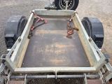 a trailer with a flat bed attached to it