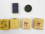several different types of cigarettes are arranged on a white surface