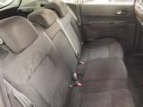 the back seats of a car are empty with no one in it
