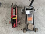 two jacks that are sitting on the ground next to each other