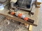 a machine that is sitting on top of a wooden table