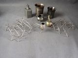 a lot of silver items that are on a table