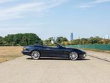 a black sports car parked on the side of the road
