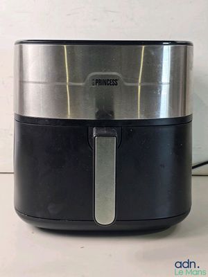 a black and silver air fryer sitting on a counter