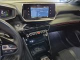 the interior of a car with a steering wheel, dashboard, and display screen