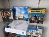 many books and games on the shelves in the room