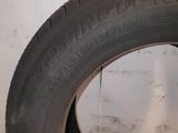 a close up of a tire with a hole in the tire