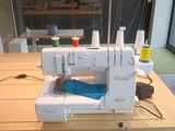 a sewing machine that is sitting on a table