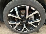 a close up of a tire on a car
