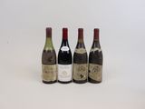 trois bouteilles de vin posées l'une à côté de l'autre sur une table