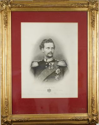 an old picture of a man in a military uniform in a gold frame