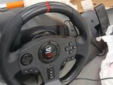a steering wheel that is sitting on a table