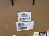 a cardboard box with a sticker on it in a store