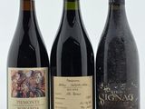 trois bouteilles de vin posées sur une table