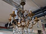 a chandelier hanging from the ceiling in a store