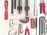 a lot of tools that are laying out on the table