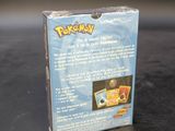 a box of pokemon cards sitting on a table