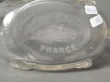 a glass bottle with a label on it that says france