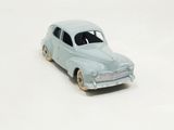 a toy car that is sitting on a white surface