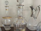 a lot of glass vases on a table