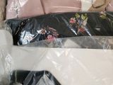 several pairs of underwear are packed in plastic bags on a table