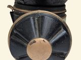 a black hat on top of a black object