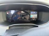 a car dashboard with a digital display on it