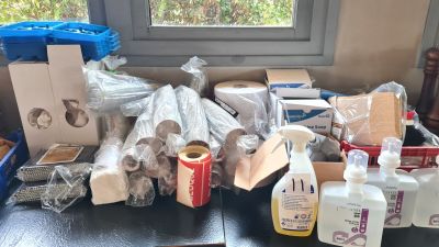 many items that are sitting on a table near a window