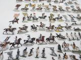 a lot of figurines that are on a table