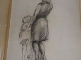drawing of a woman holding a child in her arms in a book