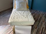 a bed that is sitting in the corner of a room