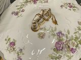 a plate with a ring on it and a plate with a ring on it