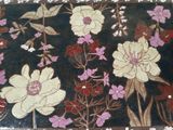 a picture of a painting of flowers on the wall