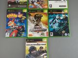 a bunch of video games sitting on top of a table