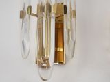 a wall light that is hanging on the wall