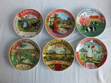 six plates with different designs on them sitting on a table