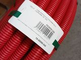 a red hose that has a price tag on it