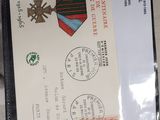 a card with a tie on it sitting on a table