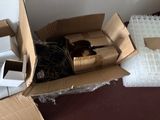 a cardboard box with a bunch of wires inside of it