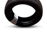 a tire that is sitting on a white surface
