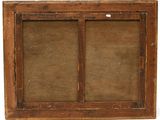 an old wooden window frame with two glass panes on it