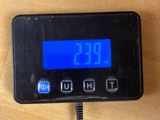 a digital clock that is on a table