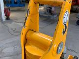 the back end of a fork attachment in a warehouse