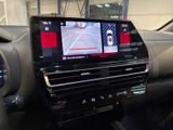 a picture of a car dashboard with a display on it