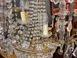 a chandelier that has a lot of crystal beads on it