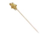 a close up of a wooden stick with a gold crown on it