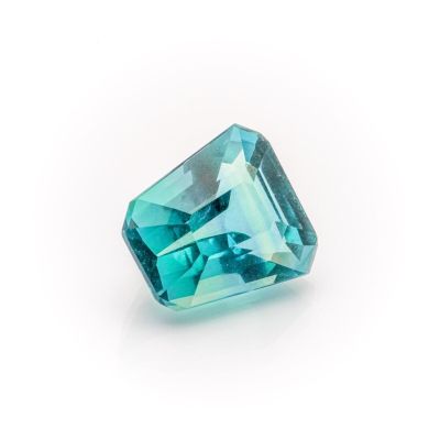 an aqua blue diamond on a white background