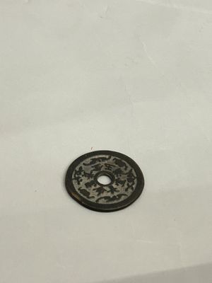 a black and white picture of a sink with a drain
