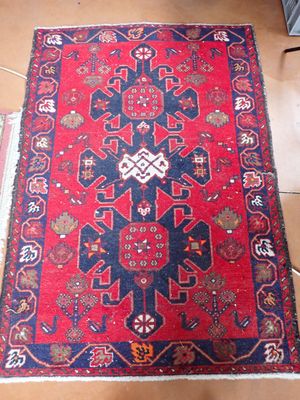 Tapis en laine nouée main, fond rouge 148 x 106 cm